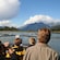 A tour group on a boat in the waters of the Alaskan wilderness